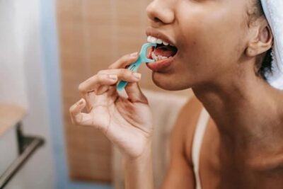 Flossing teeth