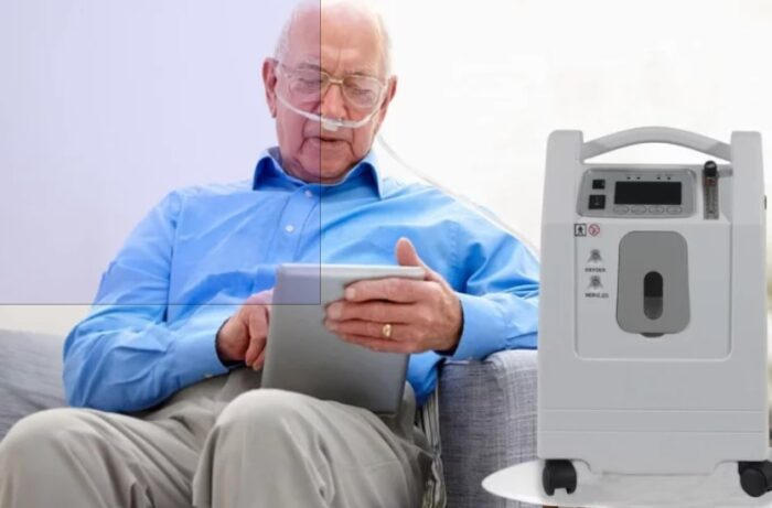 person using Evox oxygen concentrator
